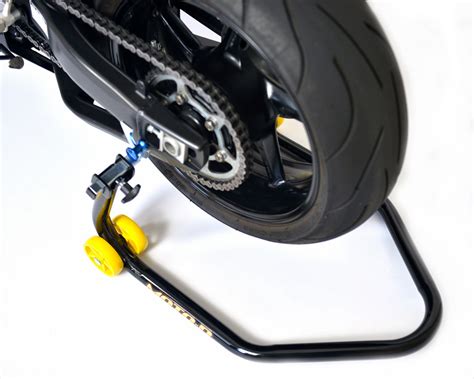 It keeps your motorcycle grounded—fixed and balanced—allowing 1. MOTO-D PRO-Series Rear Motorcycle Stand - Swingarm Stand