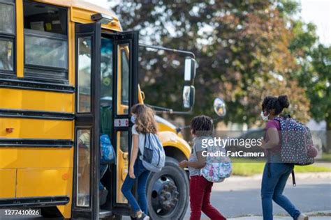 Kids Boarding School Bus Photos And Premium High Res Pictures Getty
