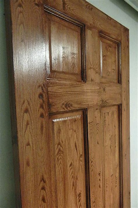 Choose an acrylic primer that is suitable for the surface you are working on: Faux Wood Grain FInish - Contemporary - Front Doors - boston - by H.D.F Painting