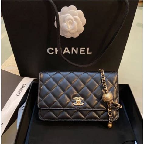 Chanel handbags receive competitive offers from rebag. Genuine CHANEL Explosion Black Lambskin Gold Ball Chain ...