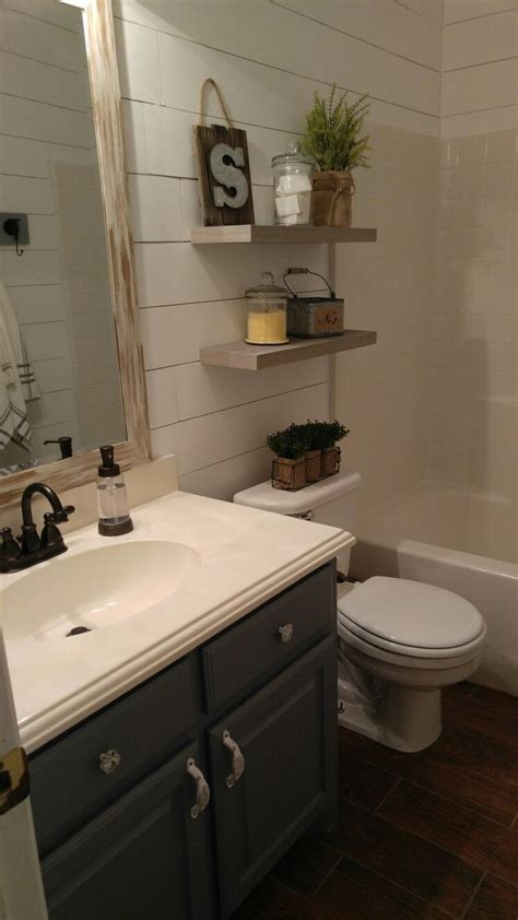 Whether you're one of the lucky few who has a bathroom with ample space and multiple sinks or you're the kind of person whose bathroom feels more like a. Farmhouse bathroom, floating shelves, DIY shiplap | Diy ...