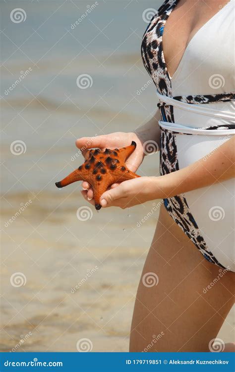 Girl Holds A Starfish On The Beach In Vietnam Stock Image Image Of Star Hand