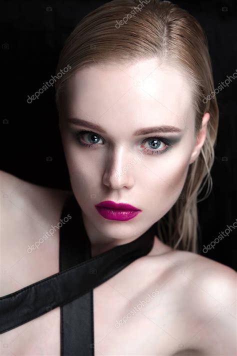 Portrait Of Beautiful Girl Model With Pink Lips And Blue Eyes With