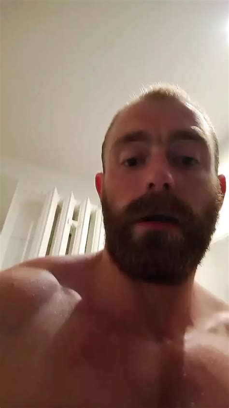 Muscular Fitness Bodybuilder Is Cleaning Body Taking Shower And Doing