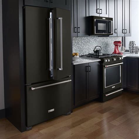 Opt for dark brown hues if you want your kitchen to have a. Home Trend: Black Stainless Steel Appliances — The Family ...
