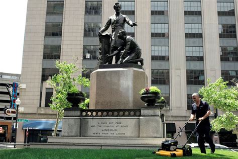 protesters remove statues of slave kneeling before lincoln