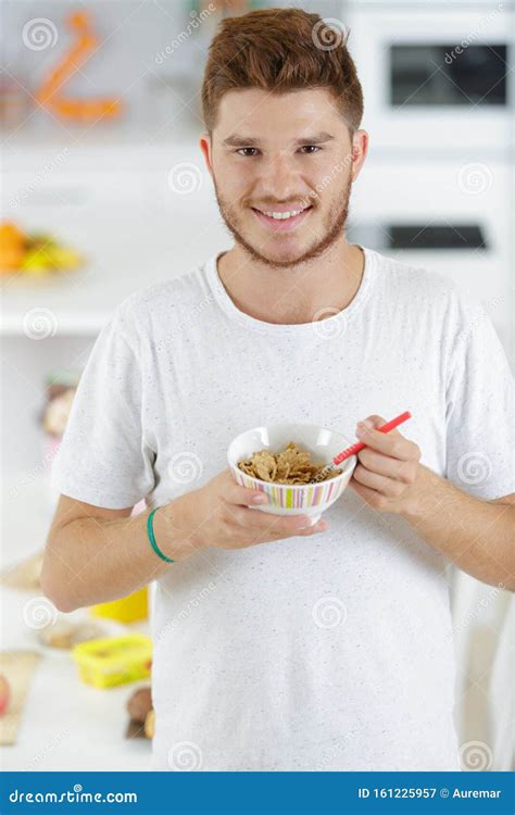 Handsome Young Guy Smiling While Eating Cereals Stock Image Image Of