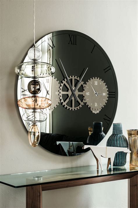 mirror clock in silk screen printing mirrored or fumé glass with steel details design andrea