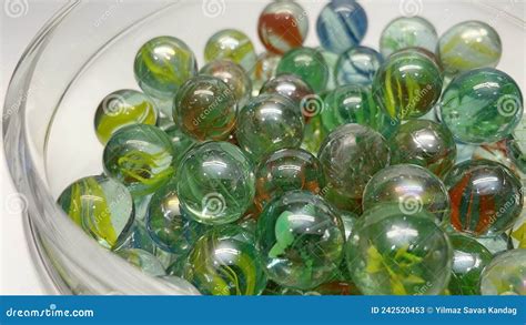 Close Up Of Colored Glass Marbles In A Glass Jar Stock Image Image Of