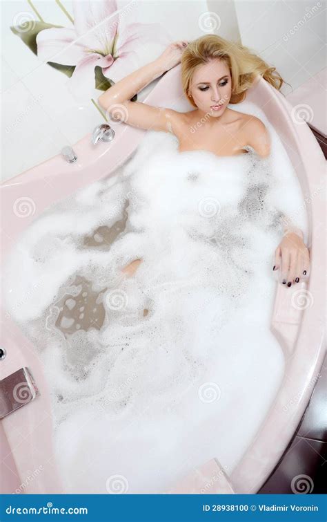 Woman Blonde In A Bath With Foam Stock Photo Image