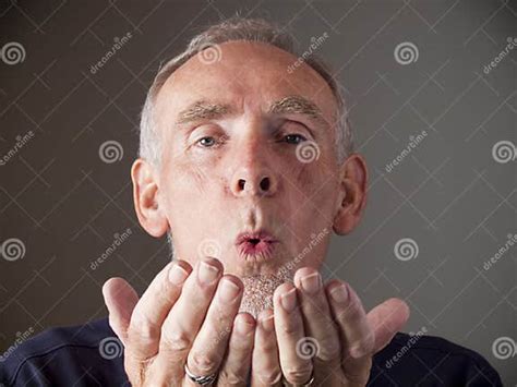 Old Man Blowing A Kiss Stock Image Image Of Senior Hands 13854719