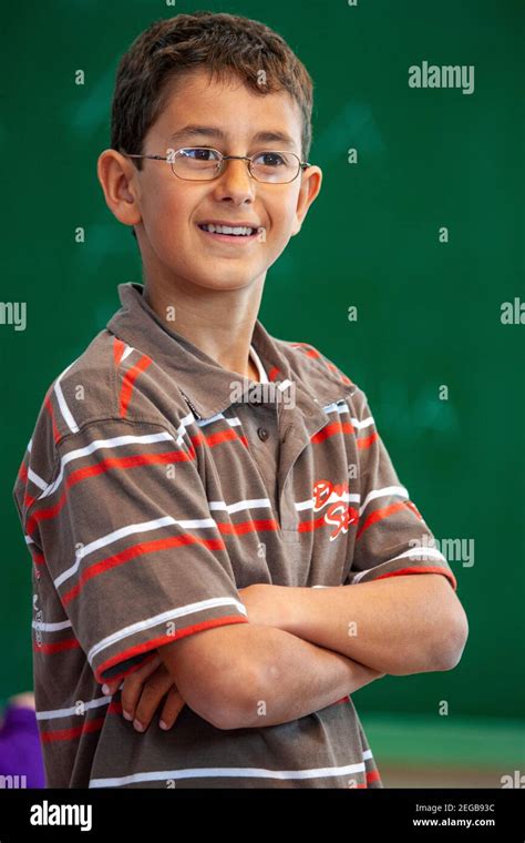 Portrait Of A Young Schoolboy In A Classroom Stock Photo Alamy