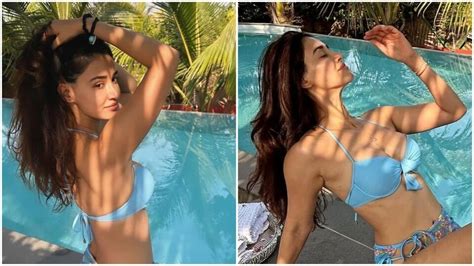 Disha Patani S Poolside Pics In Blue Bikini And Floral Sarong Sets The Temperatures Soaring
