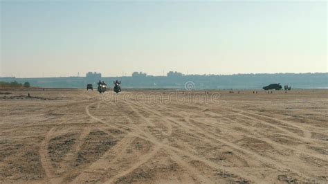 Motorcyclists Riding Along Sandy Beach Two Bikers Ride Motorcycle In