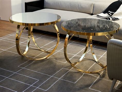 The top almost certainly pietro della valle. Nella Vetrina Ottoline Contemporary Italian Gold Metal Coffee Table