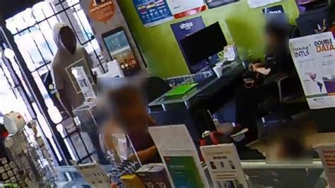 Robber Tries To Shoot And Pray His Way Out Of Store After Staff Locks Him Inside Video Abc News