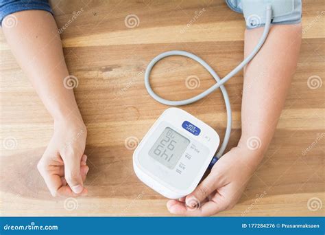 Women Measures Her Blood Pressure And Heart Rate Stock Photo Image Of