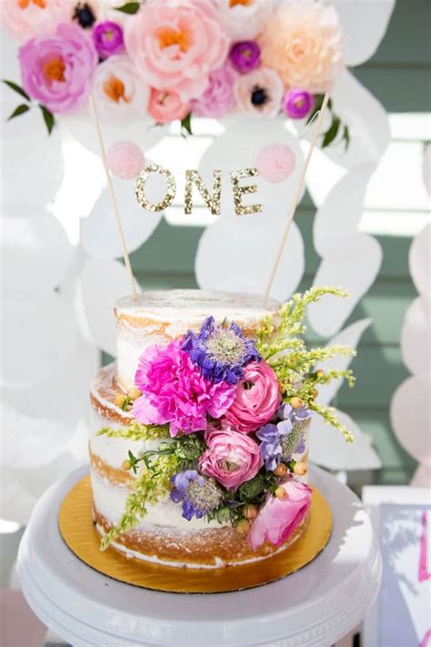Sometimes referred to as the smash cake, it's a time of celebration where the cake is special, just for them. 1st Birthday Garden Party - Pretty My Party - Party Ideas