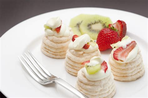 Meringue dessert with kiwi and strawberries - Free Stock Image