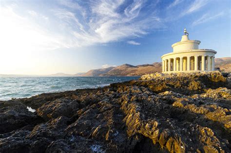 Lighthouse Of Saint Theodore On Cliffs At Sunset Argostoli Kefalonia