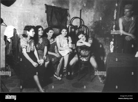 interior of a brothel in naples italy 1945 1 five prostitutes waiting for customers stock