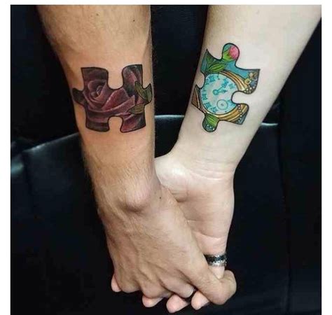 Nice couple 'heart' combination tattooed on the arms. Puzzle tattoos couple matching love | Couples tattoo ...
