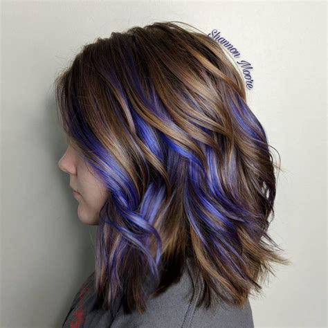 Thorne did switch it up a bit though and add these bright blue highlights on the sides. Related image (With images) | Hair color purple, Peekaboo ...