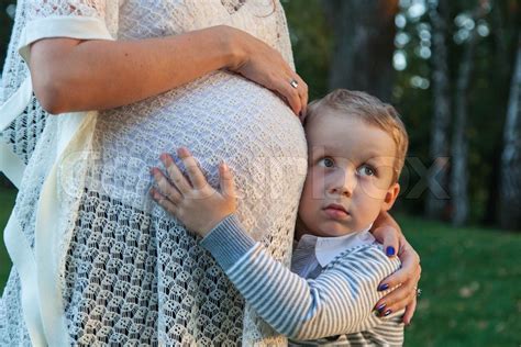 pregnant mom and her son stock image colourbox