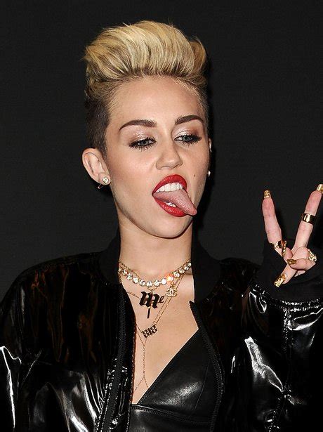 24 Mileys Look I Can Also Lick My Fingers Face Miley Cyrus