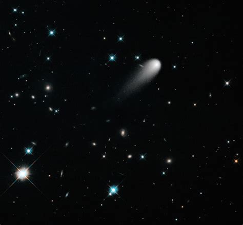 Comet Ison Blazes Through Distant Galaxies In Stunning Hubble Photo
