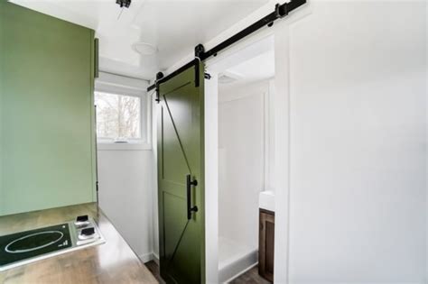Trinity Thow Modern Tiny Living Home With Stunning Green Cabinets