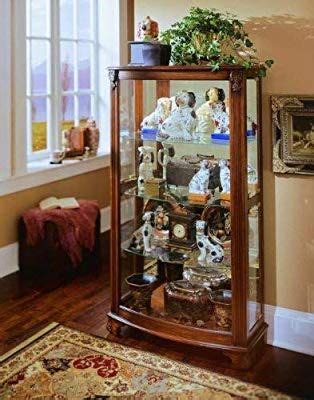 The mantel curio features side entry, a mirrored back, interior lighting, ,adjustable glass shelves and adjustable glides. Amazon.com: Pulaski Mantel Curio, 33 by 15 by 59-Inch ...