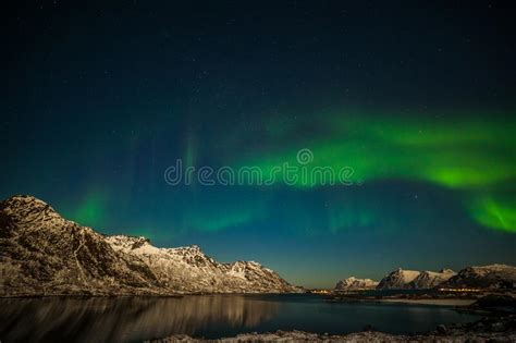 Aurora Borealis In Tromso Norway In Front Of Norwegian Fjord At Winter