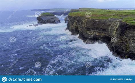 Wild Atlantic Ocean Water At The Steep Cliffs Of Ireland Stock Image