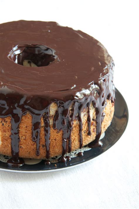 Grease an angel food cake pan or a bunt cake pan, and pour the batter in. Chocolate Angel Food Cake | Ridgely's Radar