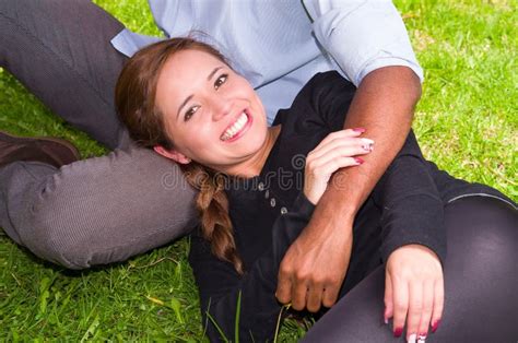 Beautiful Young Interracial Couple Sitting Garden Environment Embracing Smiling Happily To