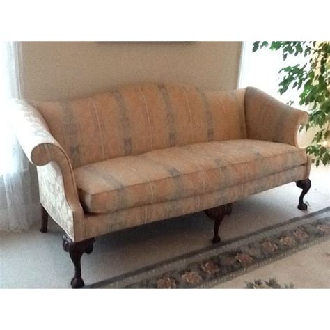 A video tutorial showing how to apply sealer to furniture using a sponge applicator. Image of Queen Anne Style Camelback Sofa