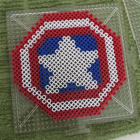 7 free iron man 3d models for download, files in 3ds, max, maya, blend, c4d, obj, fbx, with lowpoly, rigged, animated, 3d printable, vr, game. Captain America's Shield perler beads by bjalonzo | Perler bead templates, Perler patterns, Bead ...