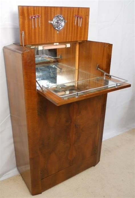 You will be happy to know that there are some fantastic cocktail arcade table for sale you can pick to enjoy the awesome retro experience one more time in your homes at a very affordable price including, 1) prime arcade llc cocktail arcade machine: Deco Burr Walnut Cocktail Cabinet | 169645 ...