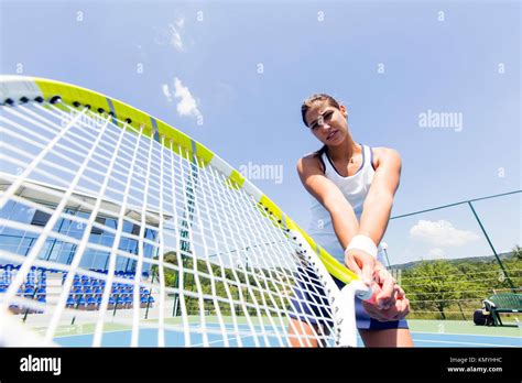 Beautiful Female Tennis Player In Action Stock Photo Alamy