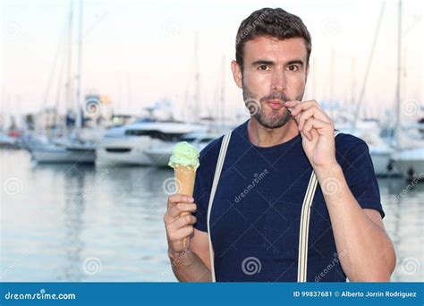 Man Eating An Ice Cream With A Spoon Stock Image Image Of Harbor