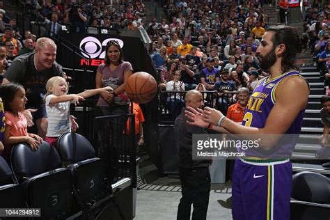 Ricky Rubio Of The Utah Jazz Plays Catch With A Young Fan During The