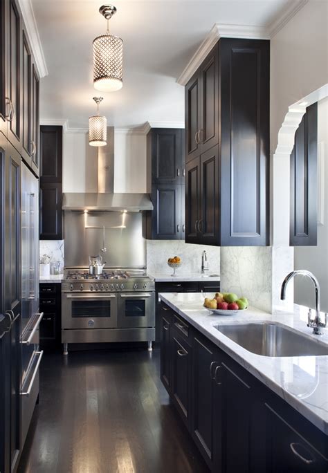 Kitchen with cherry wood cabinetry. One Color Fits Most: Black Kitchen Cabinets