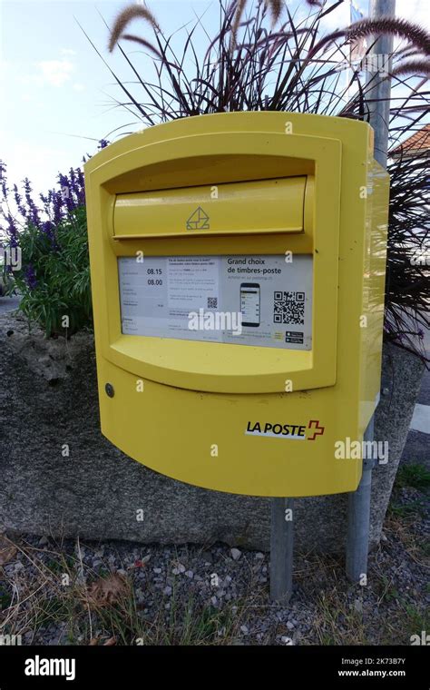 Pole Mounted Swiss Post Box Stock Photo Alamy