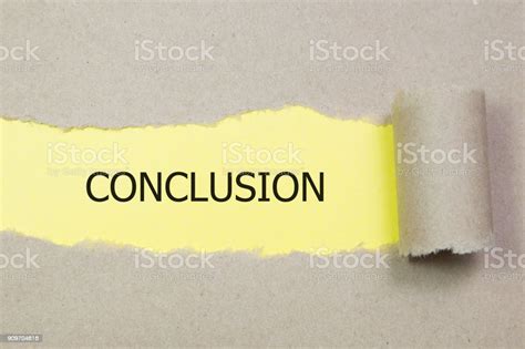 The Text Conclusion Appearing Behind Torn Paper Stock Photo Download