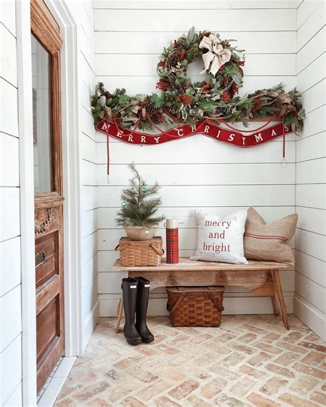 Festive Christmas Wreath With Wooden Farmhouse Bench At The Entryway