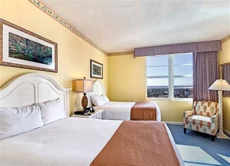 From here, guests can make the most of all that the lively city has to offer. Suite Bedroom - Wyndham Ocean Walk | Daytona beach resort ...