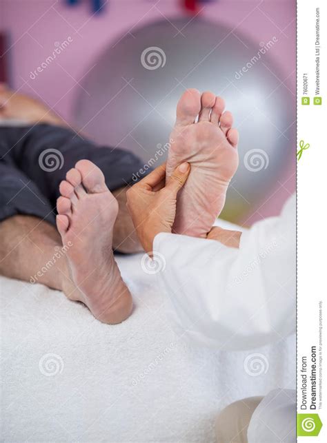 Senior Man Receiving Foot Massage From Physiotherapist Stock Image Image Of Physical Patient