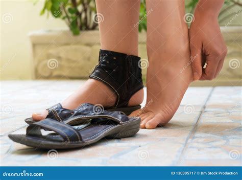 Woman Rubbing Her Feet Stock Image Image Of Feet Bare
