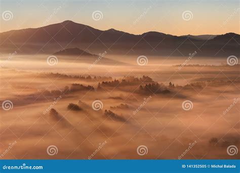 Sunrise Over Misty Landscape Scenic View Of Foggy Morning Sky With